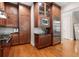 A kitchen with stainless steel appliances and wood cabinets at 1954 Saxon Valley Ne Cir, Brookhaven, GA 30319