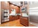 Gourmet kitchen with stainless steel appliances, custom cabinets, and ample counter space for meal preparation at 1954 Saxon Valley Ne Cir, Brookhaven, GA 30319