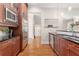 Kitchen featuring stainless steel appliances, wood cabinets, and hardwood floors at 1954 Saxon Valley Ne Cir, Brookhaven, GA 30319