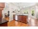 Well-designed kitchen area with hardwood floors and open access to the spacious living room at 1954 Saxon Valley Ne Cir, Brookhaven, GA 30319