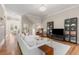 Open-concept living room with hardwood floors, recessed lighting, and access to additional living spaces at 1954 Saxon Valley Ne Cir, Brookhaven, GA 30319