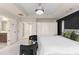 Spacious main bedroom with fireplace, tray ceiling, and white closet doors at 1954 Saxon Valley Ne Cir, Brookhaven, GA 30319