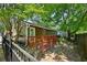 Backyard featuring a wooden deck with a brown fence, offering a cozy outdoor space at 198 Clay Se St # G, Atlanta, GA 30317
