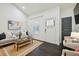 Well-lit living room featuring a comfortable couch, stylish rug, and modern decor at 198 Clay Se St # G, Atlanta, GA 30317