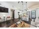 Open-concept layout showcasing the living room flowing into the kitchen, with modern appliances and stylish finishes at 198 Clay Se St # G, Atlanta, GA 30317