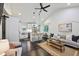 Bright, open living area featuring hardwood floors, a modern kitchen, and comfortable seating, creating an inviting space at 198 Clay Se St # G, Atlanta, GA 30317