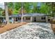 Attractive ranch home with an attached carport and a spacious driveway at 2301 Crestcliff Dr, Tucker, GA 30084