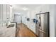 Kitchen with stainless steel appliances, white cabinets and marble countertops at 2301 Crestcliff Dr, Tucker, GA 30084