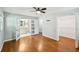 Main bedroom with hardwood floors and ensuite bathroom access at 2301 Crestcliff Dr, Tucker, GA 30084