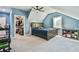 Bright bedroom with a large window, vaulted ceiling, and walk-in closet at 5315 Hendrix Rd, Cumming, GA 30040