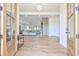 Grand entryway showcasing an open-concept living space with hardwood floors and abundant natural light at 5315 Hendrix Rd, Cumming, GA 30040