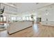 Open-concept living room with soaring ceilings providing seamless flow into the dining and kitchen area at 5315 Hendrix Rd, Cumming, GA 30040