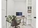 Cozy home office space with built-in shelves, a computer, and a comfortable desk chair at 5315 Hendrix Rd, Cumming, GA 30040