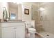 Stylish bathroom featuring a glass-enclosed shower and modern vanity with neutral finishes at 57 Weston Dr # 13, Atlanta, GA 30328