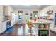 Bright eat-in kitchen with large island, bar seating, stainless appliances, and white cabinetry at 57 Weston Dr # 13, Atlanta, GA 30328