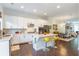 Well-appointed kitchen with modern appliances, bright cabinetry, and a center island with barstool seating at 57 Weston Dr # 13, Atlanta, GA 30328