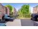 Relaxing outdoor deck with comfortable seating and lush greenery, ideal for outdoor entertaining at 57 Weston Dr # 13, Atlanta, GA 30328