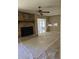 Living room view showing the brick fireplace and hardwood flooring at 4589 Mesaview Way, Stone Mountain, GA 30083