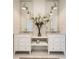 Elegant bathroom with dual vanities, large mirrors, floral accents, and stylish lighting at 1059 Antioch Dr, Brookhaven, GA 30319