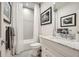 Cozy bathroom featuring a shower-tub combo and a vanity with marble countertops at 1059 Antioch Dr, Brookhaven, GA 30319