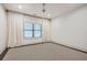 Bright bedroom features natural light, neutral carpet and trim at 1059 Antioch Dr, Brookhaven, GA 30319