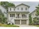 Stunning two-story home featuring a charming front porch and a two-car garage at 1059 Antioch Dr, Brookhaven, GA 30319