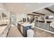 Bright, open kitchen with an island, stainless steel appliances, white cabinets, and seamless flow into living area at 1059 Antioch Dr, Brookhaven, GA 30319