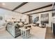 Open-concept living area featuring a cozy living room with stairs and an adjacent kitchen at 1059 Antioch Dr, Brookhaven, GA 30319