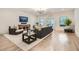 Bright living room features stylish furniture, natural light, and hardwood flooring at 1059 Antioch Dr, Brookhaven, GA 30319