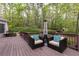 Comfortable deck seating with patio heater overlooking the serene backyard at 176 Nightwind Trce, Acworth, GA 30101