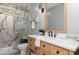 Well-lit bathroom showcasing a marble shower, vanity, and modern fixtures at 176 Nightwind Trce, Acworth, GA 30101