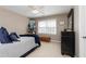 Comfortable bedroom with cozy decor, soft lighting, and ample storage space at 176 Nightwind Trce, Acworth, GA 30101