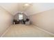 Spacious bonus room with vaulted ceiling and carpet at 176 Nightwind Trce, Acworth, GA 30101