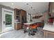 Modern kitchen featuring custom cabinets, a large island, and stainless steel appliances at 176 Nightwind Trce, Acworth, GA 30101