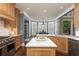 A kitchen with stainless steel appliances, a kitchen island, and a dining nook at 176 Nightwind Trce, Acworth, GA 30101