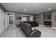 Finished basement living room with leather seating, gray walls, and carpet at 176 Nightwind Trce, Acworth, GA 30101