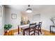 Charming dining room with a dark wood table, light walls and a view into other rooms at 2735 Shetland Dr, Decatur, GA 30033