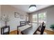 Cozy dining room features a dark wood table with a light runner and bright natural light at 2735 Shetland Dr, Decatur, GA 30033