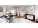 Elegant living room featuring hardwood floors, a neutral area rug, and a glimpse into the home's entry area at 2735 Shetland Dr, Decatur, GA 30033