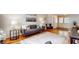 Well-lit living room with hardwood floors, a decorative rug, comfortable seating, and stylish decor at 2735 Shetland Dr, Decatur, GA 30033