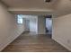Spacious finished basement area with a door leading to the bathroom at 6454 Boca Grande Blvd, Forest Park, GA 30297