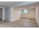Finished basement with modern floors, neutral paint, and natural light at 6454 Boca Grande Blvd, Forest Park, GA 30297