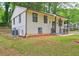 Well maintained exterior of this 2-story home with a welcoming front porch at 6454 Boca Grande Blvd, Forest Park, GA 30297