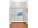 Walk-in closet featuring wooden floors and wire shelving at 898 Allene Sw Ave, Atlanta, GA 30310