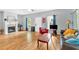 Bright living room with hardwood floors, fireplace, and comfortable seating arrangement at 898 Allene Sw Ave, Atlanta, GA 30310