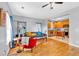 Cozy living room with hardwood floors, leading into kitchen with stainless steel appliances at 898 Allene Sw Ave, Atlanta, GA 30310