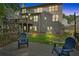 Backyard features a deck and outdoor seating, with stairs leading to a patio below at 905 Fox Croft Pl, Canton, GA 30114