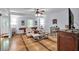 Relaxing living room with plush seating, wood furniture and a neutral palette, offering a cozy space at 905 Fox Croft Pl, Canton, GA 30114