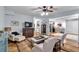 Charming living area featuring comfortable chairs, a dark wood dresser and unique, decorative accents at 905 Fox Croft Pl, Canton, GA 30114