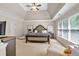 Bright and spacious main bedroom featuring a king-size bed and plenty of natural light at 905 Fox Croft Pl, Canton, GA 30114